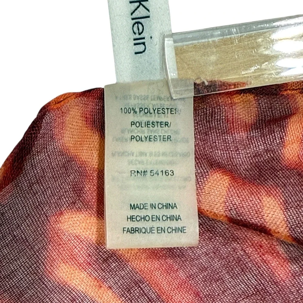 Calvin Klein Lightweight Scarf Red Orange Pattern Fringe Hem Gold Logo Charm